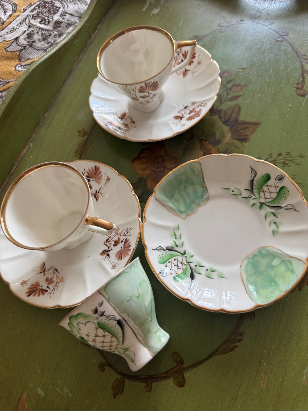 Porcelain Tea Cups and Saucers Set with Green and Gold Accents